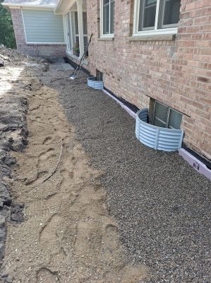 Backfill installed  next to foundation. Wall was waterproofed and insulated previously
